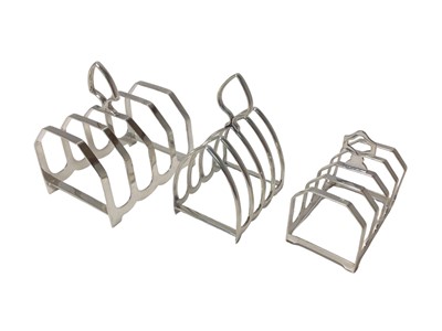 Lot 220 - 1930s silver four division toast rack of angular form and two others