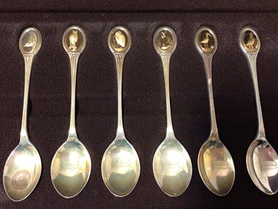 Lot 251 - Cased set of twelve RSPB silver teaspoons, with silver gilt terminals