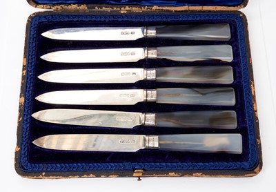 Lot 280 - A set of six agate handled silver knives, in case