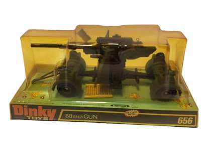 Lot 14 - Dinky Aveling Barford Diesel Roller No.279, Ford transit Fire Appliance No.286, Muir Hill 2WL Loader No.437, Bren Gun Carrier with Anti-Tank Gun No.619 & 88mm Gun No.656, all in bubblepack and base...