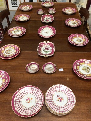 Lot 146 - Quantity of 19th century ground puce ground dinner and tea wares, some pieces painted with landscape scenes and flowers
