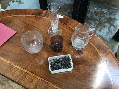 Lot 46 - Group of antique glassware, including a fluted ale glass, circa 1800, a cut glass tea caddy bowl, a cut glass jug from the Piccadilly Hotel, and a box of glass trade beads