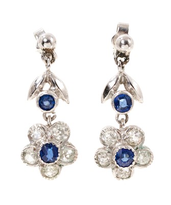Lot 733 - Pair of white gold sapphire and diamond flower head drop earrings