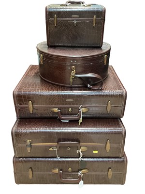 Lot 2063 - Group of vintage 1950s/60s Samsonite faux crocodile luggage, including three suitcases, a hatbox and a vanity case