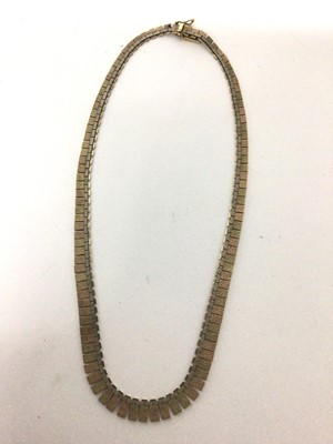 Lot 16 - 9ct three-colour gold Cleopatra style fringe necklace