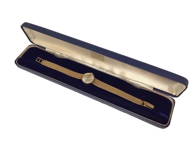 Lot 65 - Garrard 9ct gold ladies wristwatch on 9ct gold bracelet, in original case