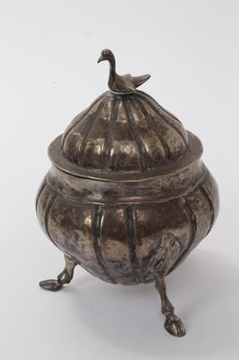Lot 507 - Continental silver sucrier of cauldron form, raised on three hoof feet, with slip in cover
