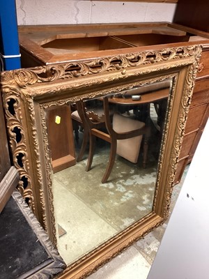 Lot 1380 - Bevelled wall mirror in ornate pierced 98cm x 120cm