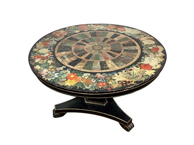 Lot 1593 - Unusual Regency ebonised and faux pietra dura breakfast table, the circular tilt top, painted with floral border and concentric faux specimen marble panels, on facetted column and triform platform...
