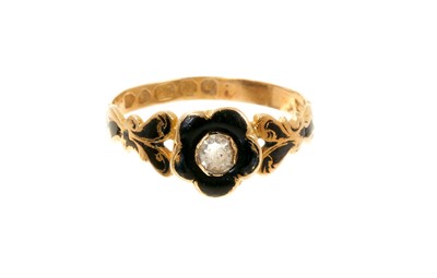 Lot 772 - Victorian 18ct gold and black enamel mourning ring, the flower shaped bezel with a paste stone, black enamel scroll shoulders on engraved gold shank. Inscribed 'Mrs A. Skinner, 25th Oct. 1863' Ring...