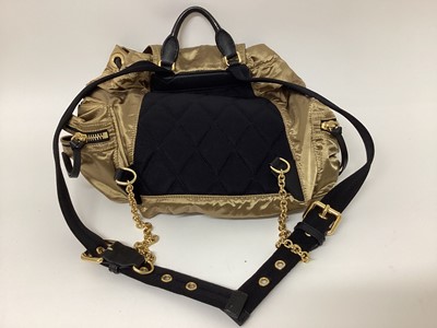 Lot 2077 - Burberry gold silky fabric with black leather and canvas trims, black logo lining and soft dust bag.