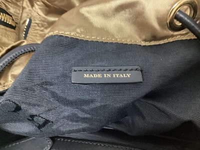 Lot 2077 - Burberry gold silky fabric with black leather and canvas trims, black logo lining and soft dust bag.