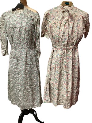Lot 2094 - 1940's dresses including two day dresses in small floral print, another day dress in abstract bird and flower print.  Two full length fit and flare dresses, one of which is an evening dress in gold...
