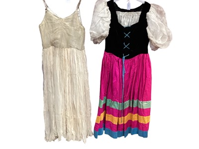 Lot 2096 - 1920's party dress with shoe string straps, gold bodice with cream chiffon crepe over layer and gathered skirt, Germanic style 'fancy dress' dress, 1940's green satin skirt and pink short sleeve bl...