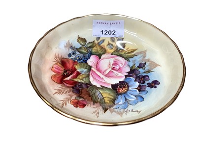Lot 1202 - Aynsley flower painted saucer by Bailey