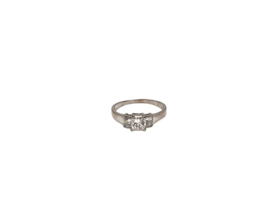 Lot 145 - Diamond three stone ring with three princess cut diamonds, estimated to weigh approximately 0.75cts in total, in four claw setting on 18ct white gold shank.