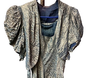 Lot 2106 - 1940s blue and silver evening dress with ruched bodice and matching fabric flowers at neckline plus bolero with puffed draped short sleeves.  Also a black and pink shoe string strap evening dress...