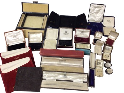 Lot 691 - Box of antique and later jewellery boxes to include Carrington & Co., Marx & Co., J. W. Benson, Cartier pouches and others