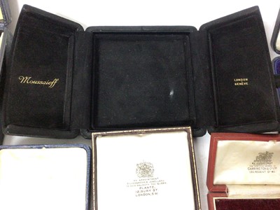 Lot 691 - Box of antique and later jewellery boxes to include Carrington & Co., Marx & Co., J. W. Benson, Cartier pouches and others
