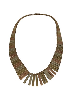 Lot 50 - 9ct three colour gold Cleopatra style fringe necklace