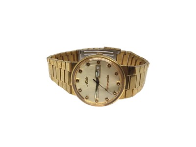 Lot 80 - Mido Commander Ocean Star Dataday gold plated stainless steel wristwatch
