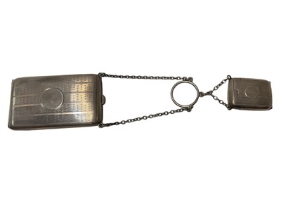 Lot 74 - Ladies Silver Vesta and cigarette case joined by chains with engine turned decoration (Birmingham 1918)