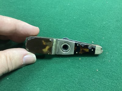 Lot 80 - Unusual Victorian combined Vesta case, cigar cutter and multiple bladed pen knife of bottle shape with nickel frame and tortoishell side plates, the blades marked Richards, Piccadilly 87mm long