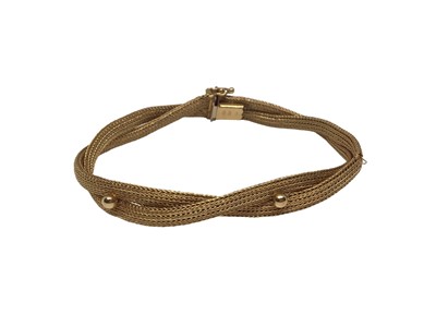 Lot 87 - Gold (stamped 750) two strand woven bracelet with applied ball decoration