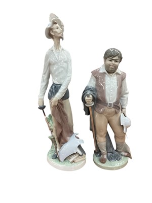 Lot 1191 - Two Lladro porcelain figures - Sancho and Quixote standing up, both boxed