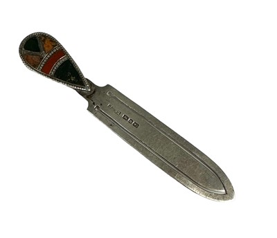 Lot 44 - Late Victorian silver bookmark with inset Scottish hardstone decoration (Birmingham 1895), 8cm long