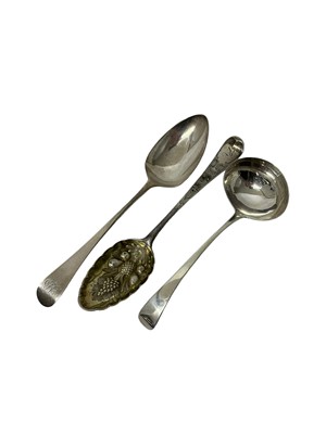 Lot 53 - George III silver old English pattern sauce ladle, George III silver table spoon and another Georgian silver spoon with later embossed berry decoration, all at 5.1ozs