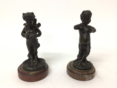 Lot 160 - After Clodion, two 19th century bronze studies of classical fawns, signed on rouge marble bases, approx 15cm high