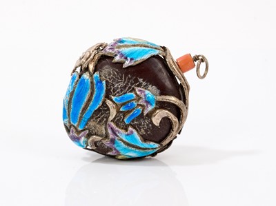 Lot 792 - Chinese snuff with enamelled silver overlay on nut