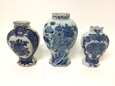 Lot 21 - Three 18th century tinglazed pottery vases