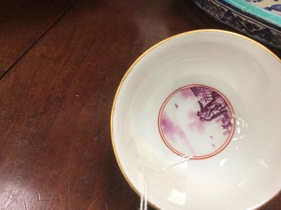 Lot 168 - Meissen tea bowl, painted in coloured enamels with figures and shipping in a continuous estuary landscape, the interior unusually painted in purple monochrome with figures in a harbour scene, circa...