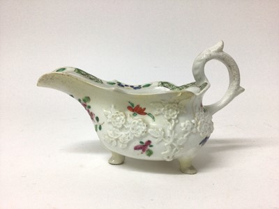 Lot 163 - Bow prunus moulded sauceboat, painted in famille rose style, circa 1752