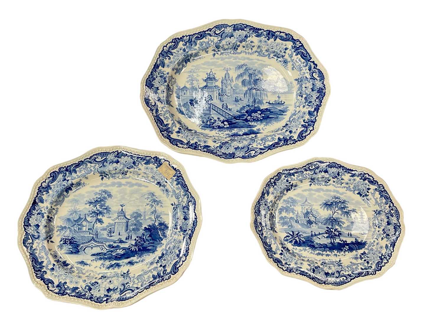 Lot 156 - Set of three Wedgwood graduated meat dishes, printed in blue with a Chinese river landscape