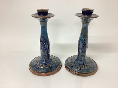 Lot 1256 - Pair of Royal Doulton stoneware candlesticks