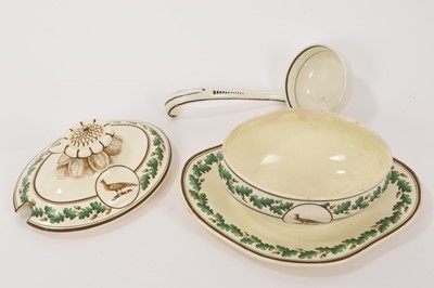 Lot 130 - Wedgwood Queensware crested sauce tureen, cover and fixed stand, circa 1800, and a ladle