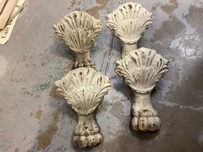 Lot 564 - Set four Victorian cast iron lions paw bath feet
