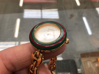 Lot 134 - Gucci gold plated ladies wristwatch with interchangeable bezels, boxed, together with a group of other wristwatches