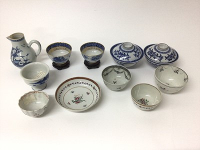 Lot 58 - Group of 18th century Chinese porcelain, including a pair of blue and white tea bowls on stands, a pair of rice bowls and covers, a blue and white cream jug, two grisaille tea bowls, a blue and whi...