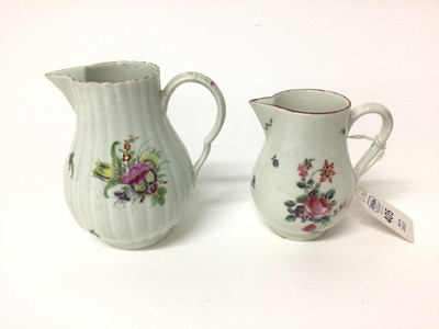 Lot 64 - Two 18th century Worcester sparrow beak cream jugs, one with a fluted body, both polychrome decorated with floral sprays, 8.75cm and 10.5cm high