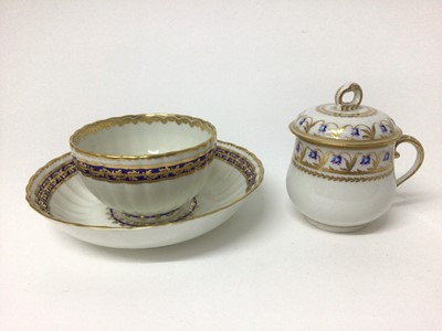 Lot 71 - Crown Derby custard cup and cover, circa 1790, with foliate pattern in enamels and gilt, and a Crown Derby fluted tea bowl and saucer, all with puce marks (3)