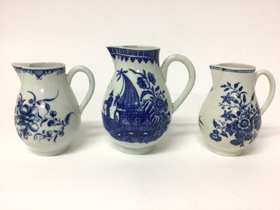 Lot 72 - Three 18th century Worcester blue and white printed sparrow beak jugs, one with the Fisherman and Cormorant pattern, one Mansfield pattern, and the other in the Three Flowers pattern, the largest 1...