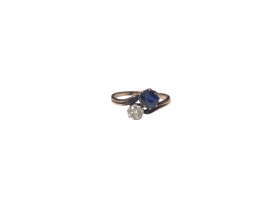 Lot 15 - Victorian sapphire and diamond two stone cross over ring