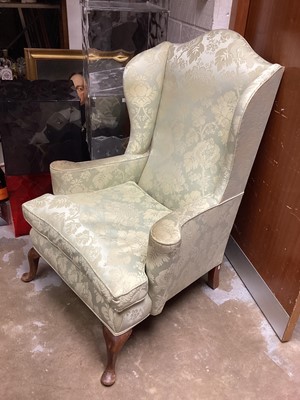 Lot 1295 - Georgian-style wing chair with green upholstery on cabriole front legs