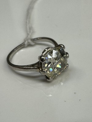 Lot 445 - Diamond single stone ring with a cushion shape old cut diamond