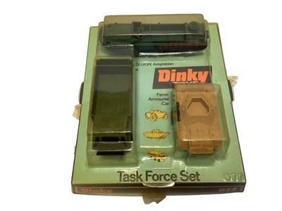 Lot 64 - Dinky Task Forde Set  with D.U.K.W. Amphibian, Ferret Armoured Car & Stalwart Load Carrier No.677 and Muir Hill 2WL Loader No.437, both on blue & black plinth witj bubblepack (2)