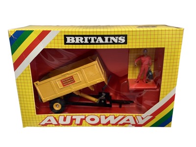 Lot 31 - Britains Autoway Heavy Tipping Trailer No.9833, Safety trailer No.9845, Front Digger Attachment No.9834, Snowplough Attachment No.9839 & Compressor No.9840, all in yellow window boxes (5)
